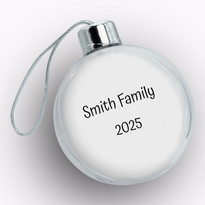 Round white ornament with 'Smith Family 2025' text on a light gray background