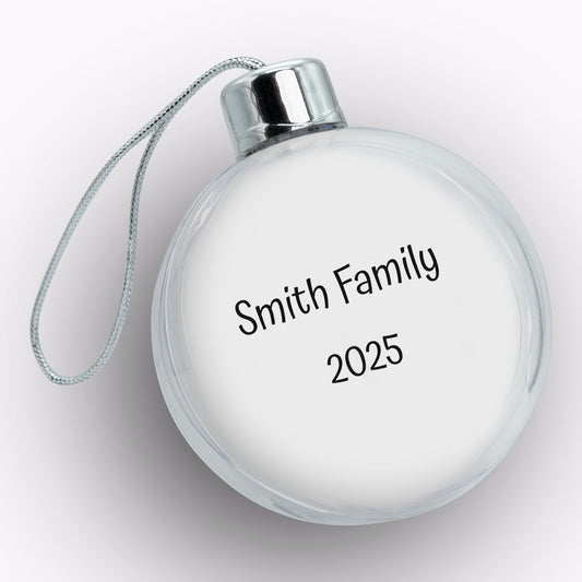 Round white ornament with 'Smith Family 2025' text on a light gray background